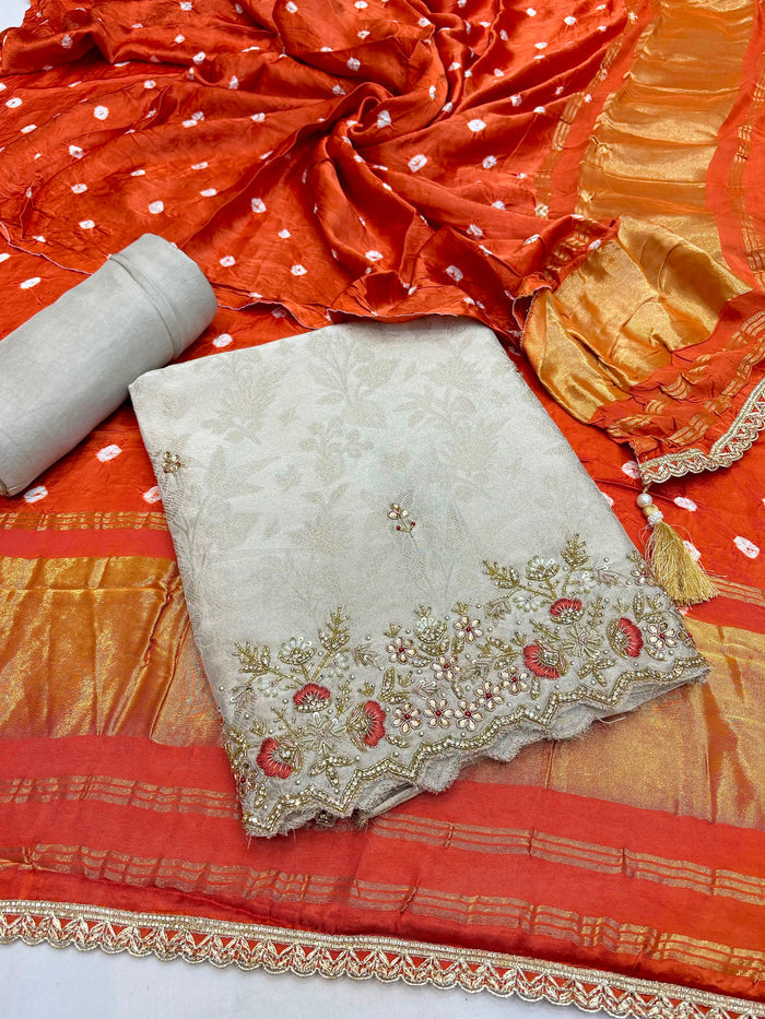 Beautiful Embroidered  Tissue Silk Shirt Along With  Modal Bandhani Prints  Dupatta And Soft Silk  Bottom