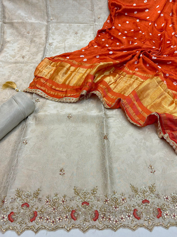 Beautiful Embroidered  Tissue Silk Shirt Along With  Modal Bandhani Prints  Dupatta And Soft Silk  Bottom