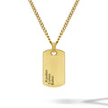 Gold necklace with a dog tag pendant on a white background
