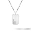 Silver dog tag necklace with engraved names on a white background