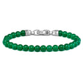 Green beaded bracelet with silver clasp on a white background