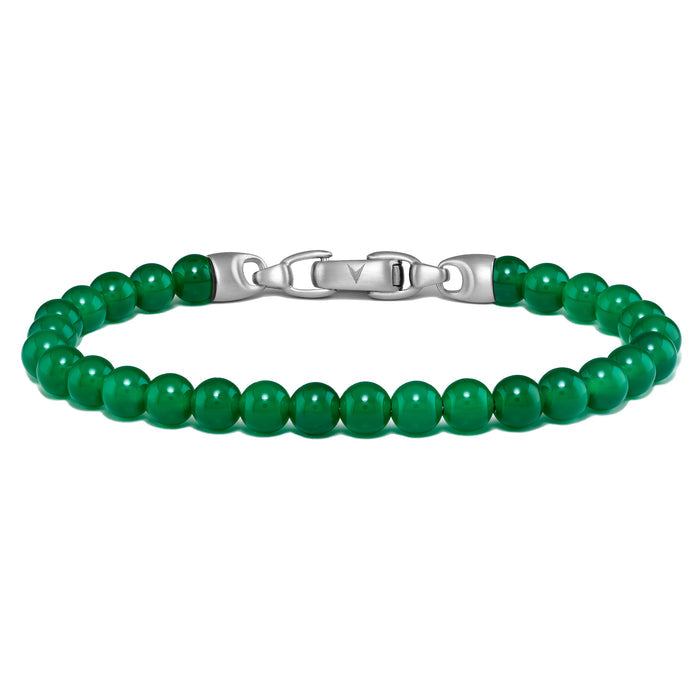 Green beaded bracelet with silver clasp on a white background