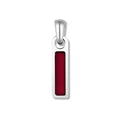 A silver pendant with a red tag attached to it.