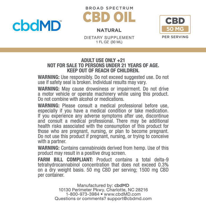 A white informational card with black and gold text about CBD oil from cbdMD. The card includes product details such as 'Broad Spectrum CBD Oil Natural', 'Dietary Supplement', 'Adult Use Only +21', warning statements, and manufacturing contact information.; Flavor: Natural; Strength: 1500MG;