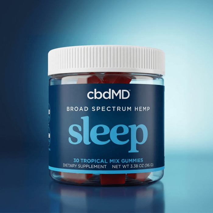 Jar of broad specrum hemp sleep gummies on a blue gradient background.