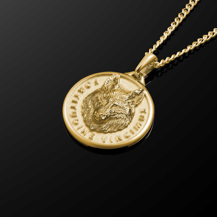 Gold necklace with a wolf pendant on a black background