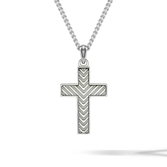 A sterling silver cross pendant necklace with a textured chevron pattern, suspended from a matching silver ball chain against a white background.