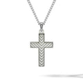 A sterling silver cross pendant necklace with a textured chevron pattern, suspended from a matching silver ball chain against a white background.