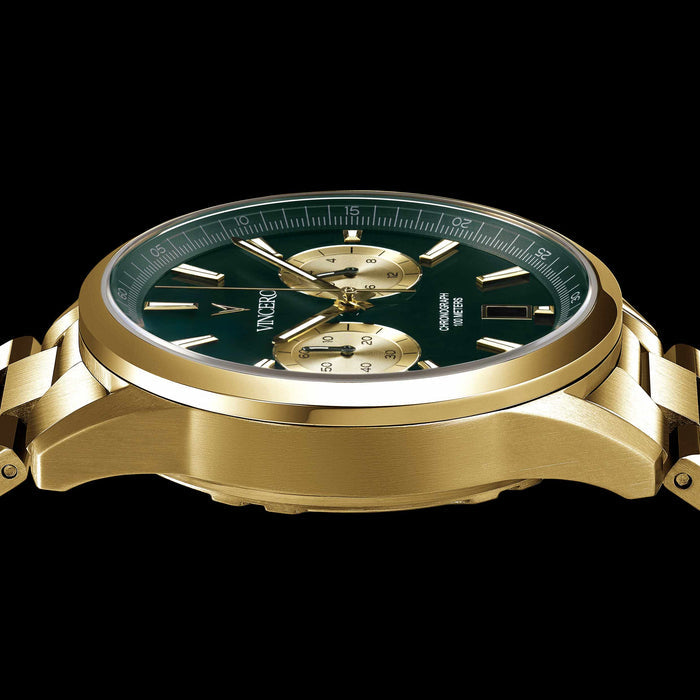 Gold wristwatch with a green dial on a black background