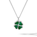 Four-leaf clover pendant on a silver chain against a white background