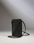 a black purse with a strap