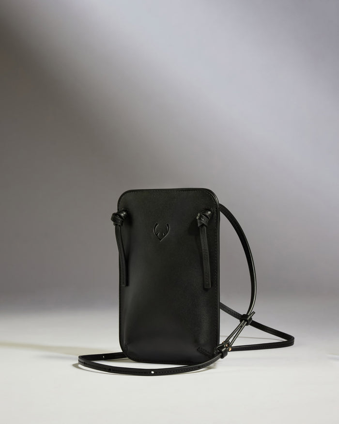 a black purse with a strap