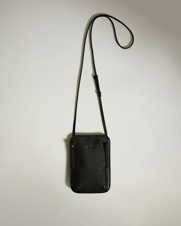 a black purse with a strap