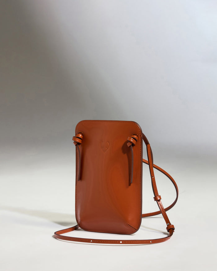 a brown purse with a strap