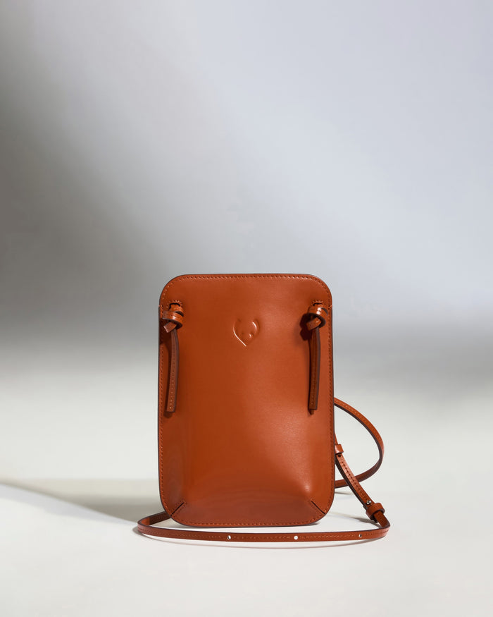 a brown purse with a strap