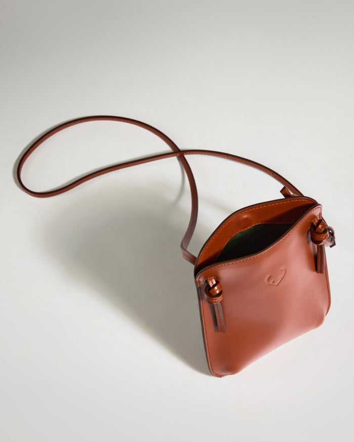a brown purse with a strap