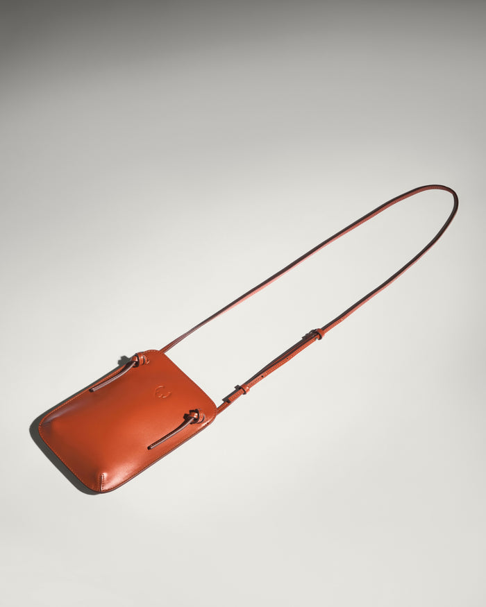 a small purse on a string