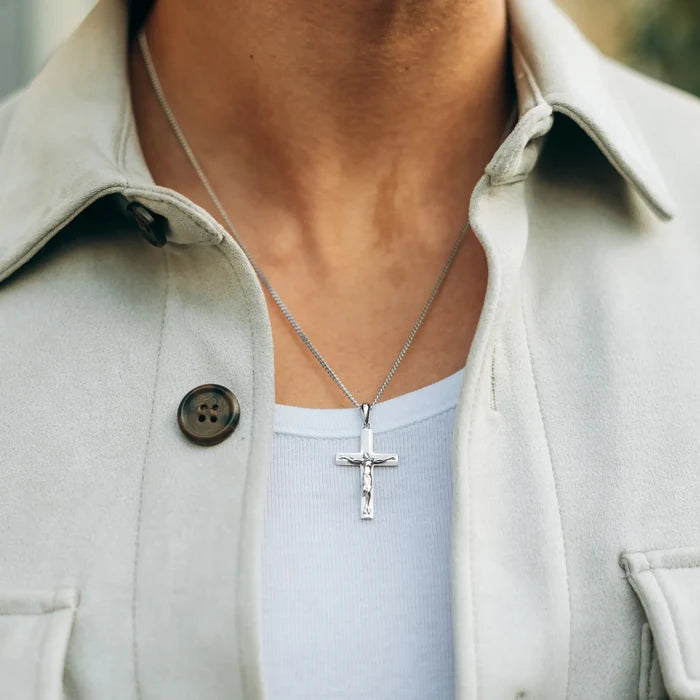 Silver chain necklace with a cross pendant