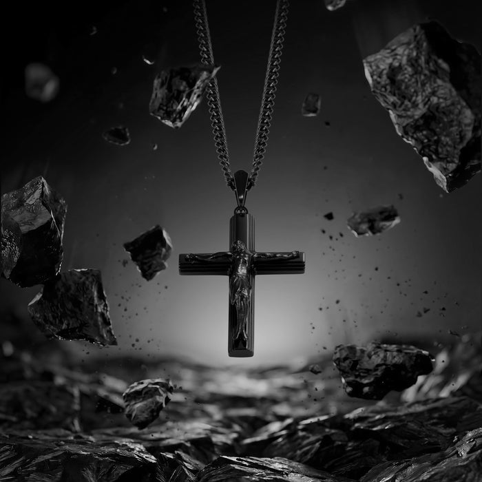 Black crucifix shown with black rock. It's being shattered in the background. Pin it for men.