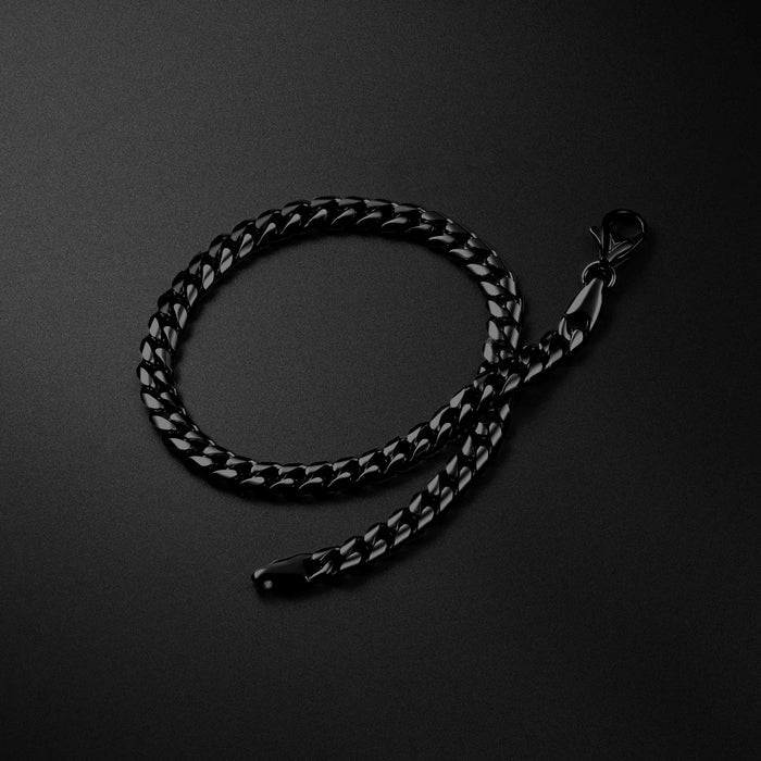 Black chain leash on a dark gray background