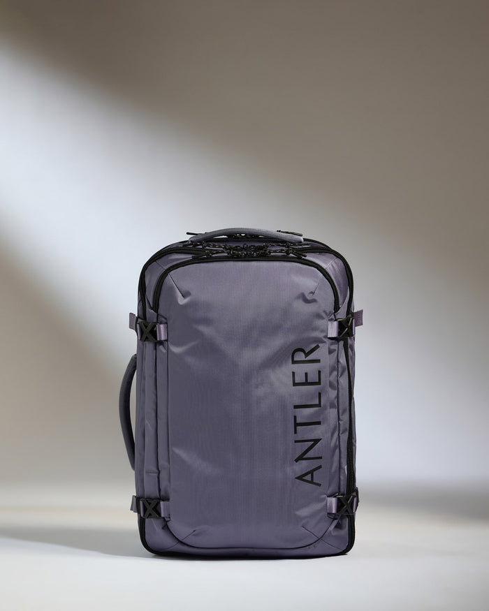 a grey suitcase with a handle