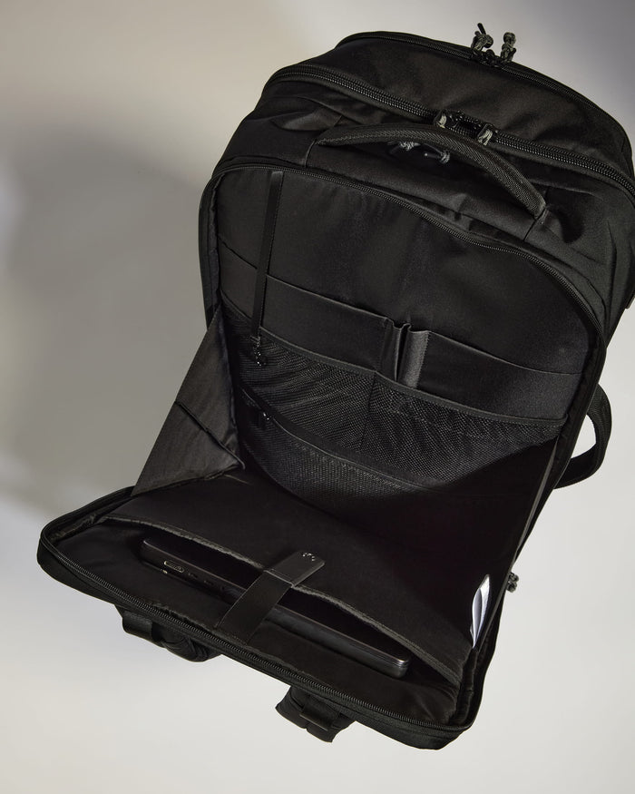 a black bag with a tablet in it