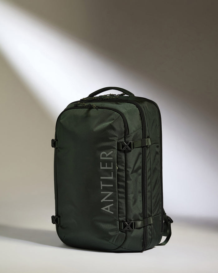 a green bag with a white background