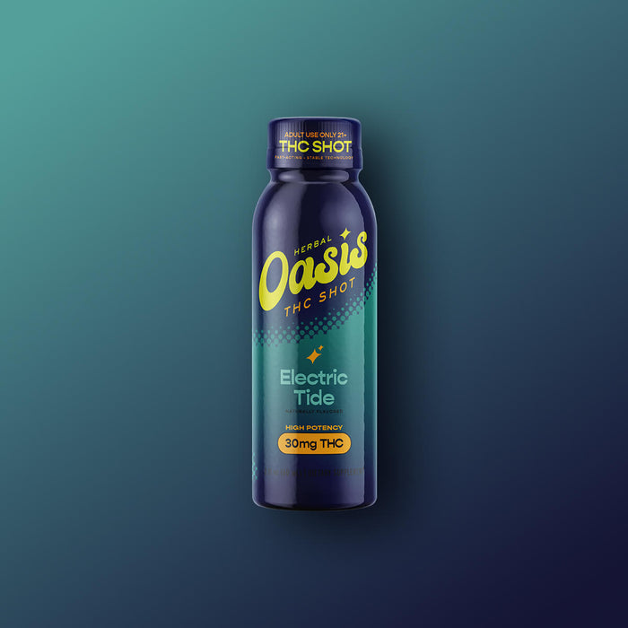 cbdMD Electric Tide 30mg THC Shot herbal beverage bottle on a teal background
