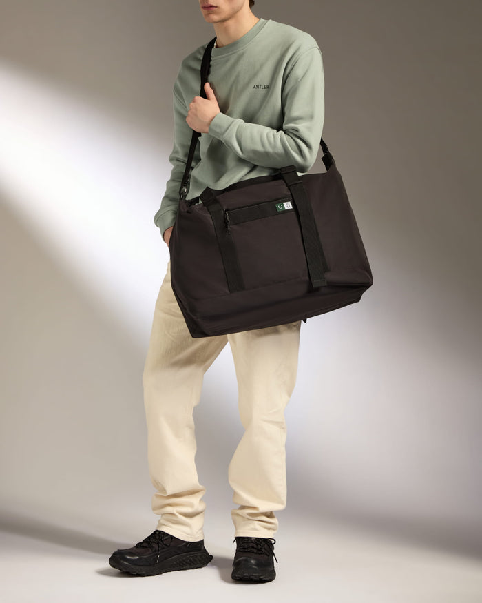 a man holding a bag