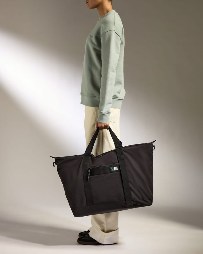 a woman holding a bag