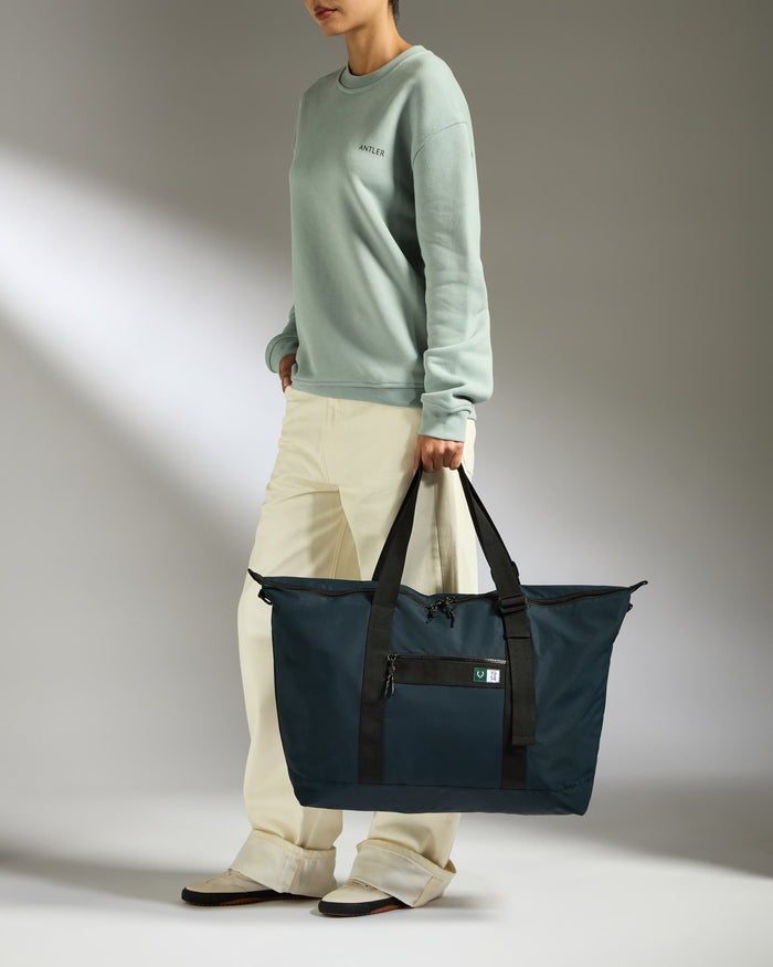 a woman holding a bag