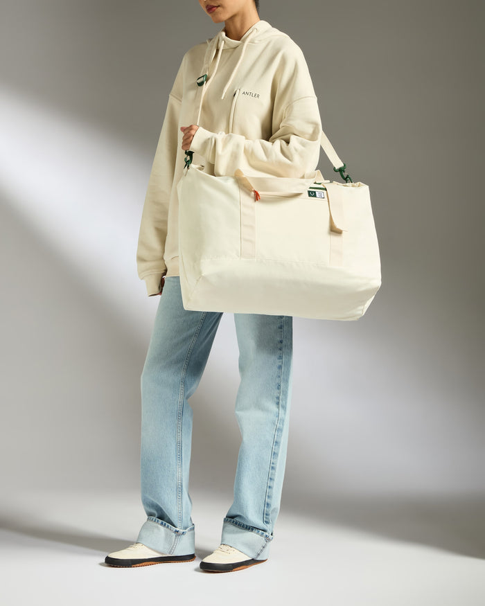 a person holding a bag