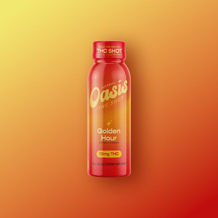 A red bottle of cbdMD Golden Hour 10mg THC Shot dietary supplement on a yellow-orange gradient background.