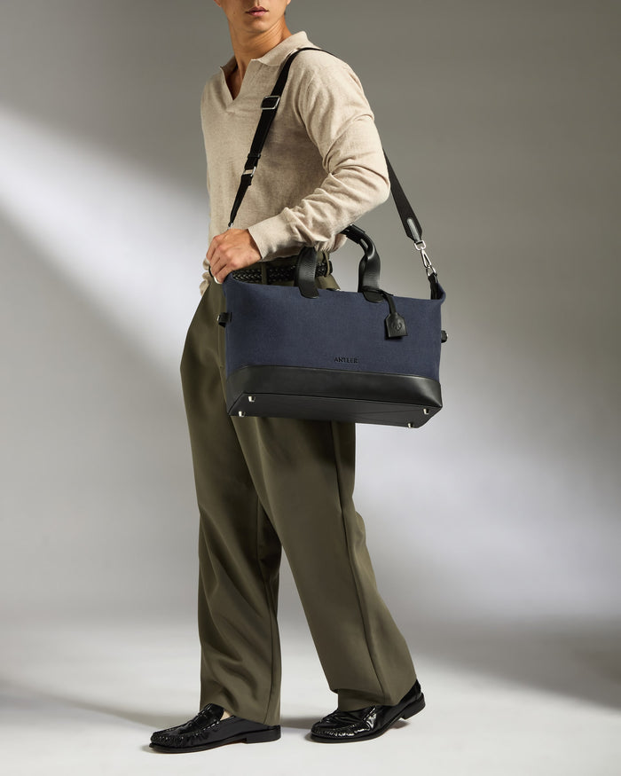 a man holding a bag
