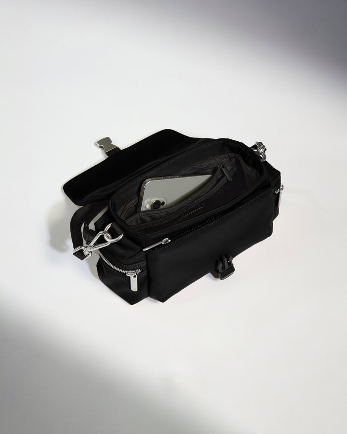 a black bag with a phone in it