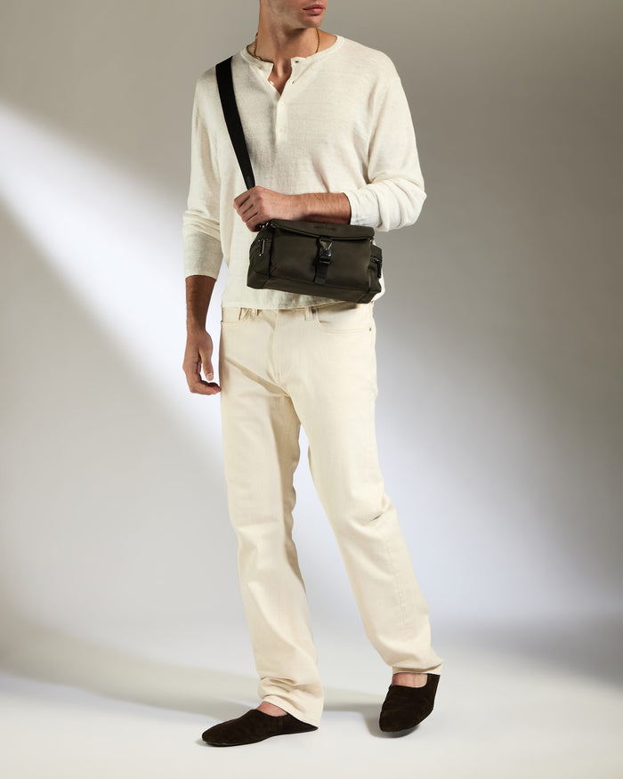 a man in white clothes