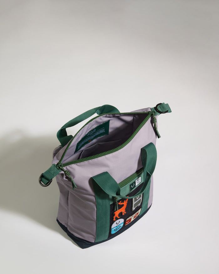a grey and green bag