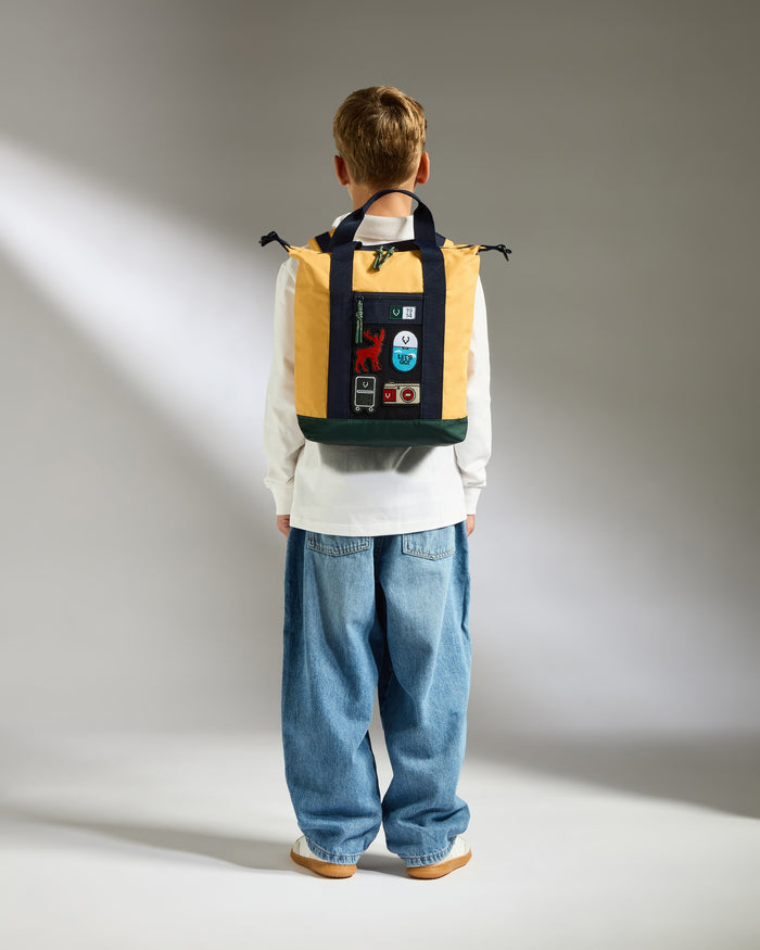 a boy wearing a backpack