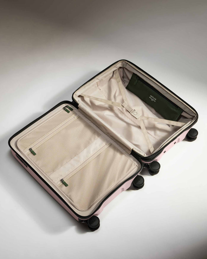 a suitcase with wheels and a zipper