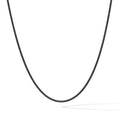 Black chain necklace on a white background