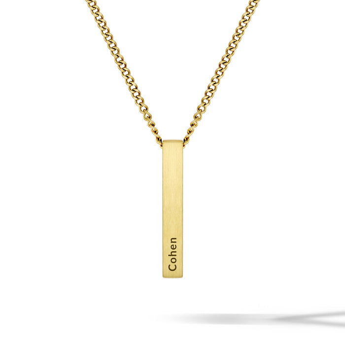 Gold necklace with a vertical bar pendant engraved with 'Cohen' on a white background