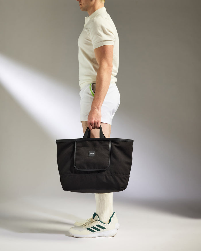a man holding a bag