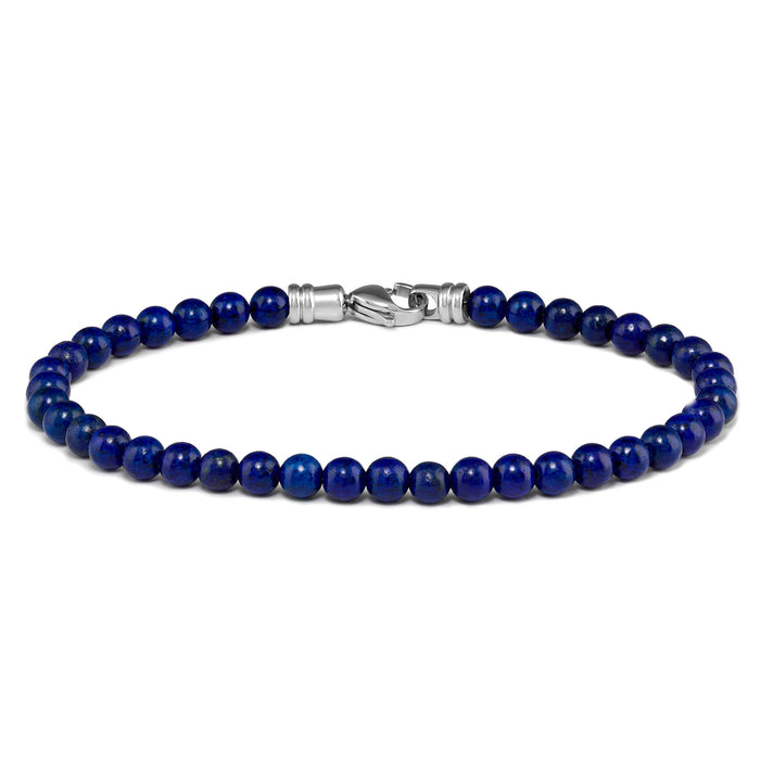 A bead bracelet made of blue lapis lazuli with a silver clasp, displayed against a white background.