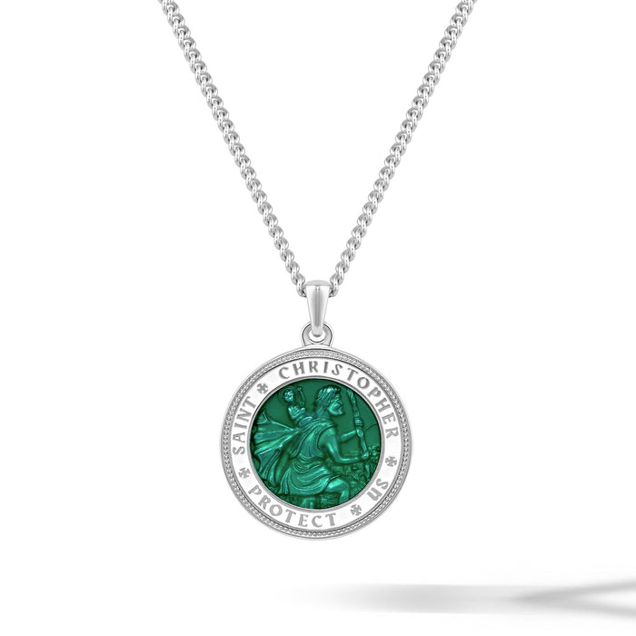 Silver necklace with a green pendant on a white background