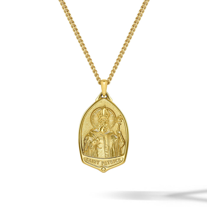 Gold necklace with a pendant on a white background