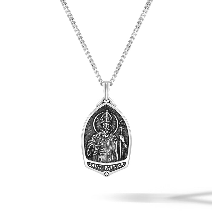Silver pendant necklace with 'Saint Patrick' design on a white background