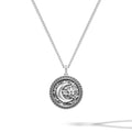 Silver necklace with a moon and star pendant on a white background