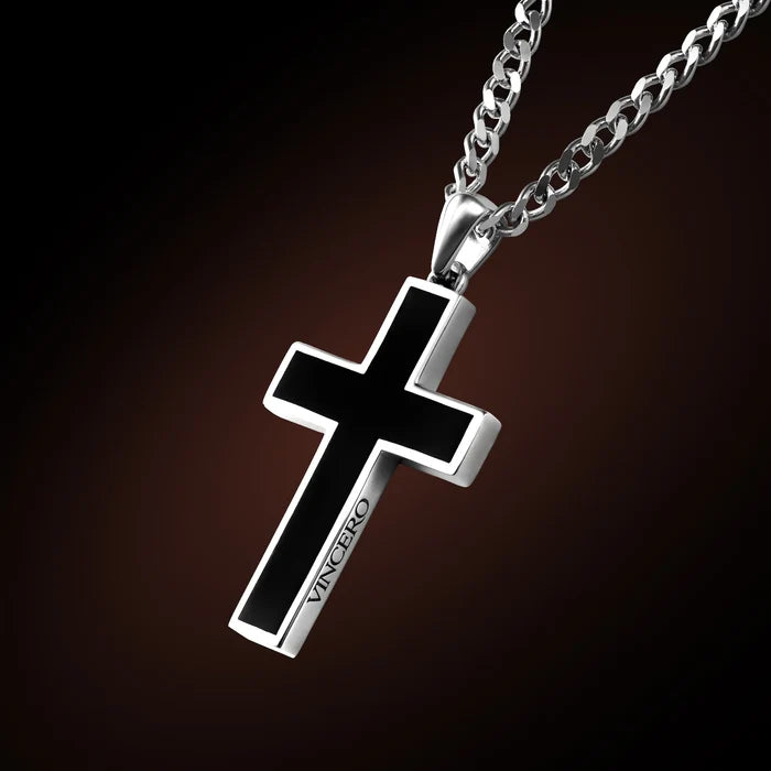 Black cross pendant on a silver chain