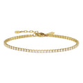 Gold bracelet with clear stones on a white background