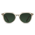 A pair of round-framed champagne-colored sunglasses with green tinted lenses and marble inlay on the temples.